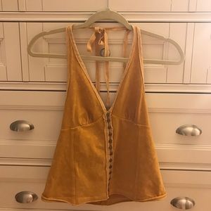 Yellow tank with buttons